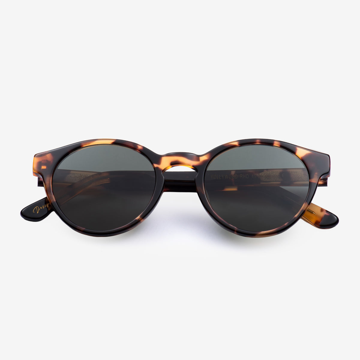 a pair of black glasses on a white surface