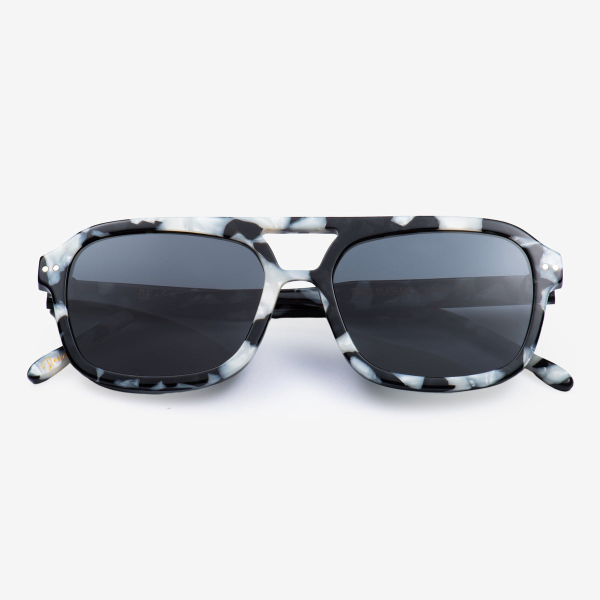 a pair of black glasses on a white surface