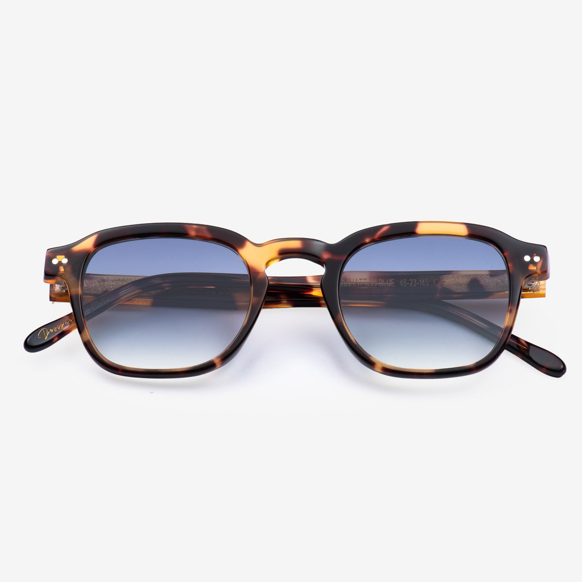 a pair of scissors sitting on top of a table