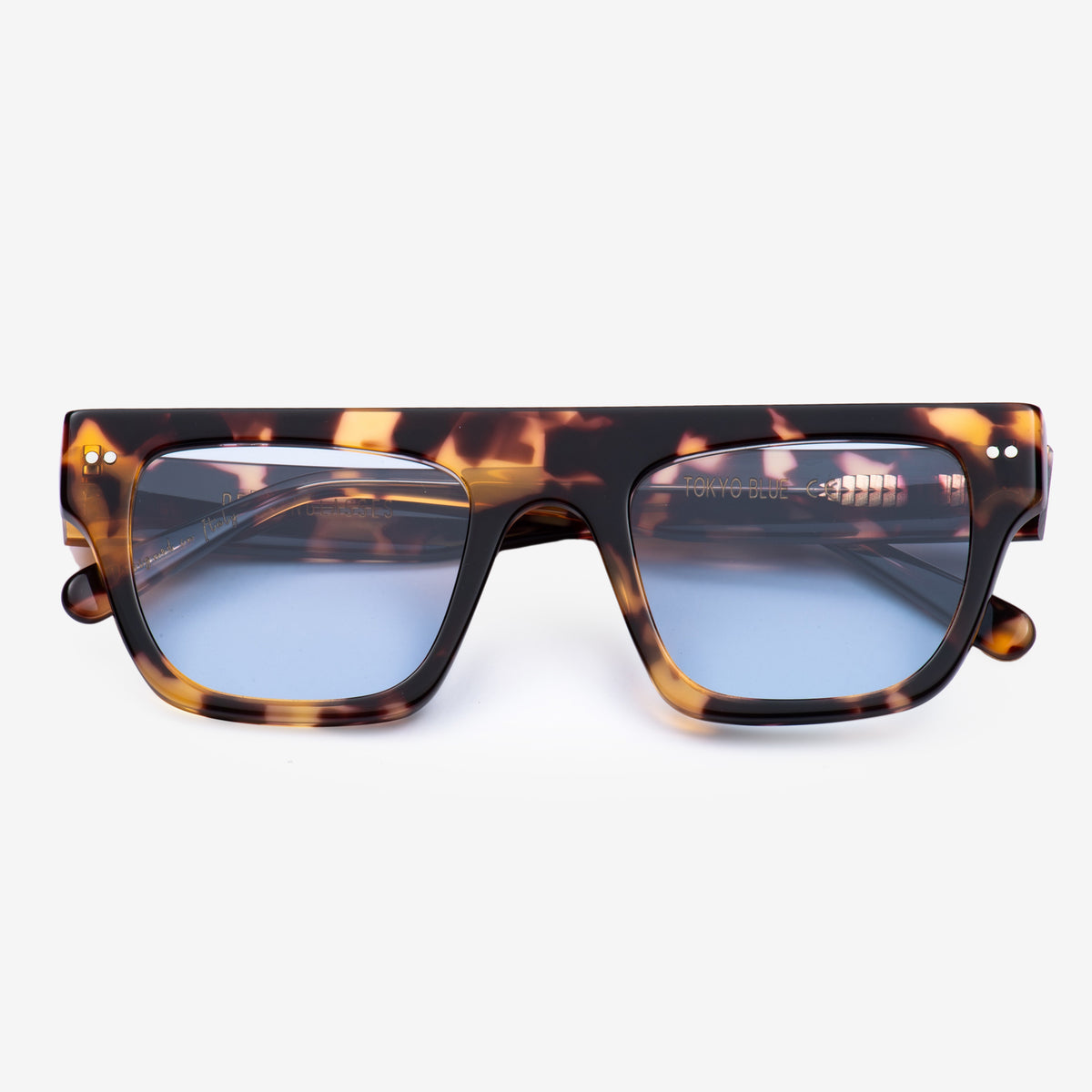 a pair of scissors sitting on top of a table