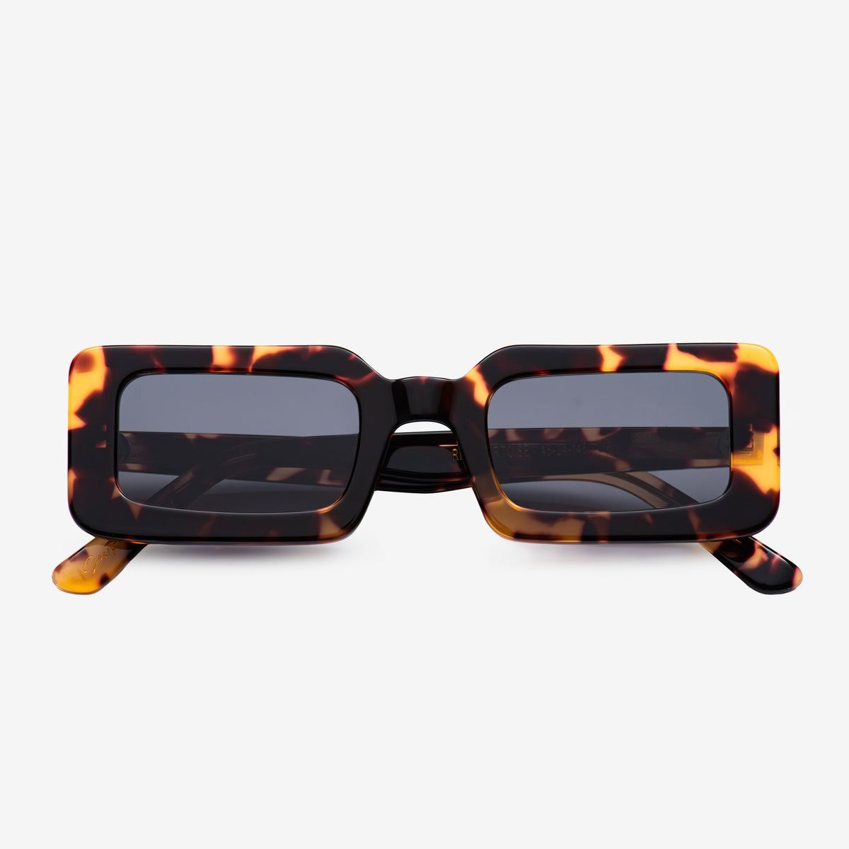 a couple of cell phones sitting on top of a table